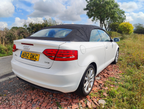 2012 White Audi A3 Convertible Sport TFSi rear three quarter view